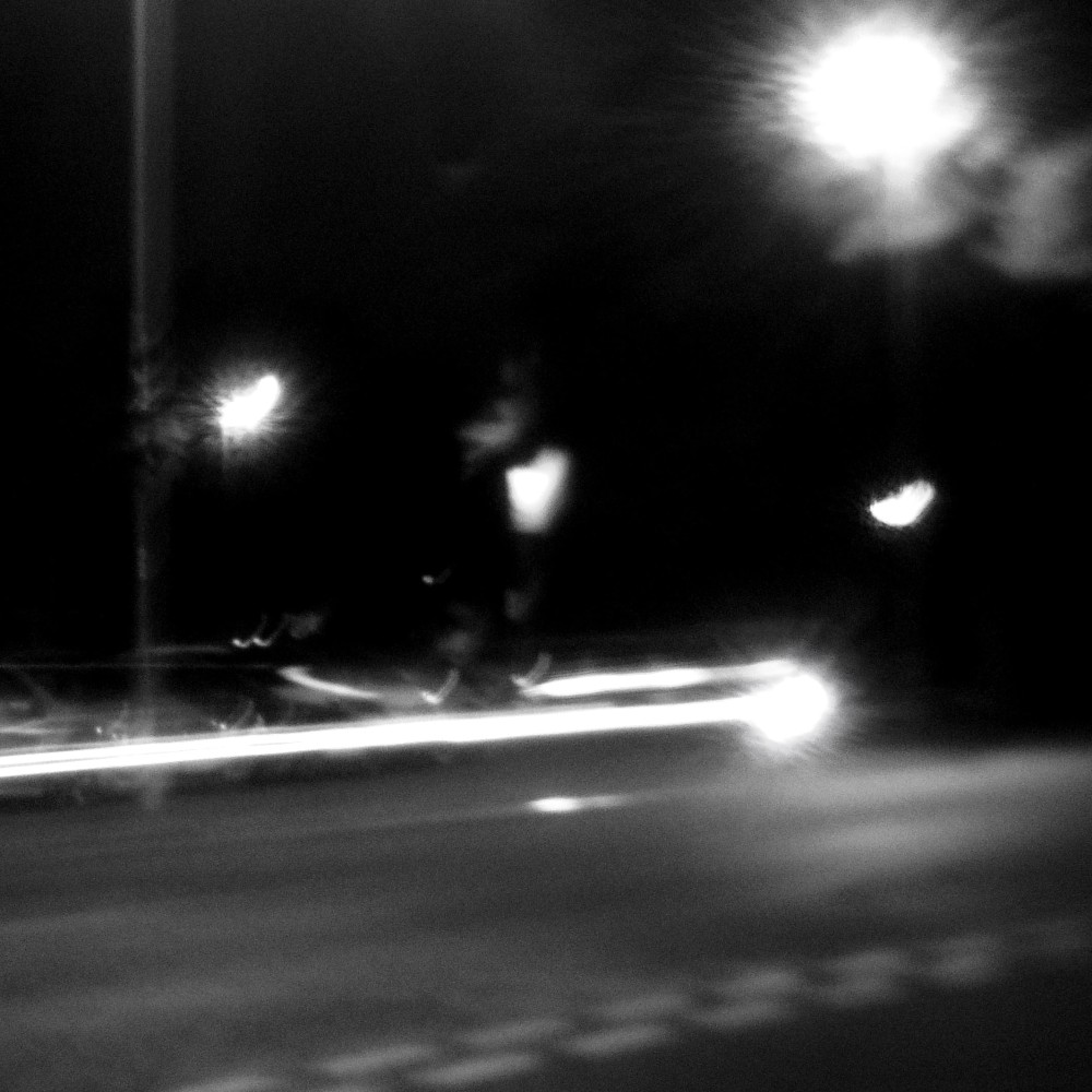 A trail of lights as a car turns for home